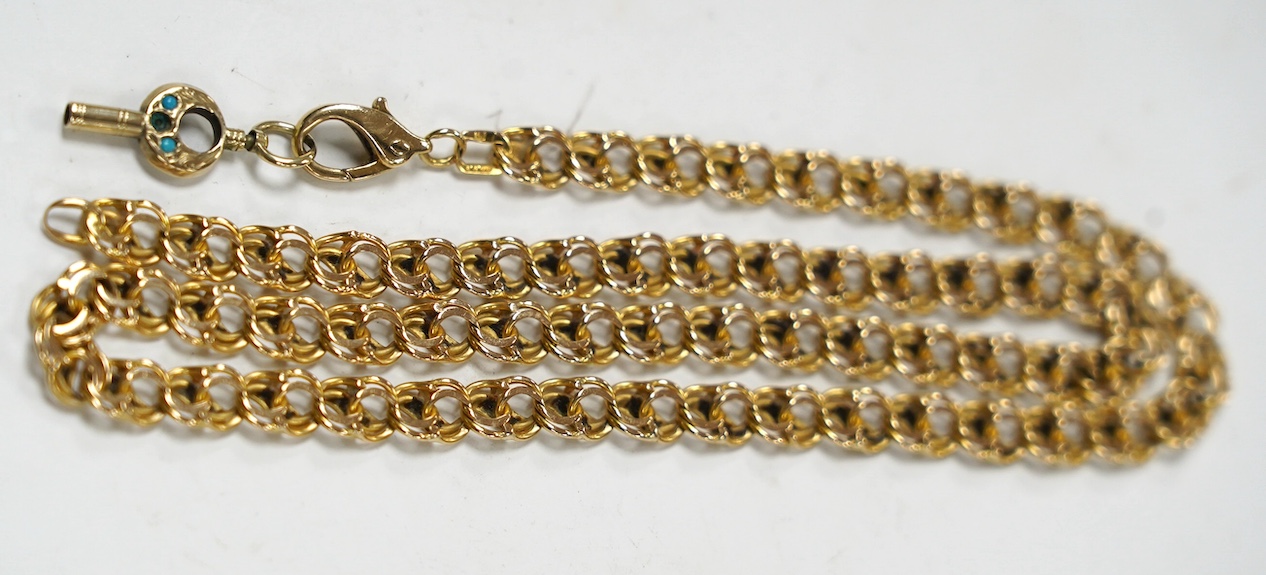 A yellow metal chain, the clasp arm stamped '750, one link stamped 9kt, hung with a small enamel set watch key, 42cm, gross weight 21.5 grams. Condition - fair